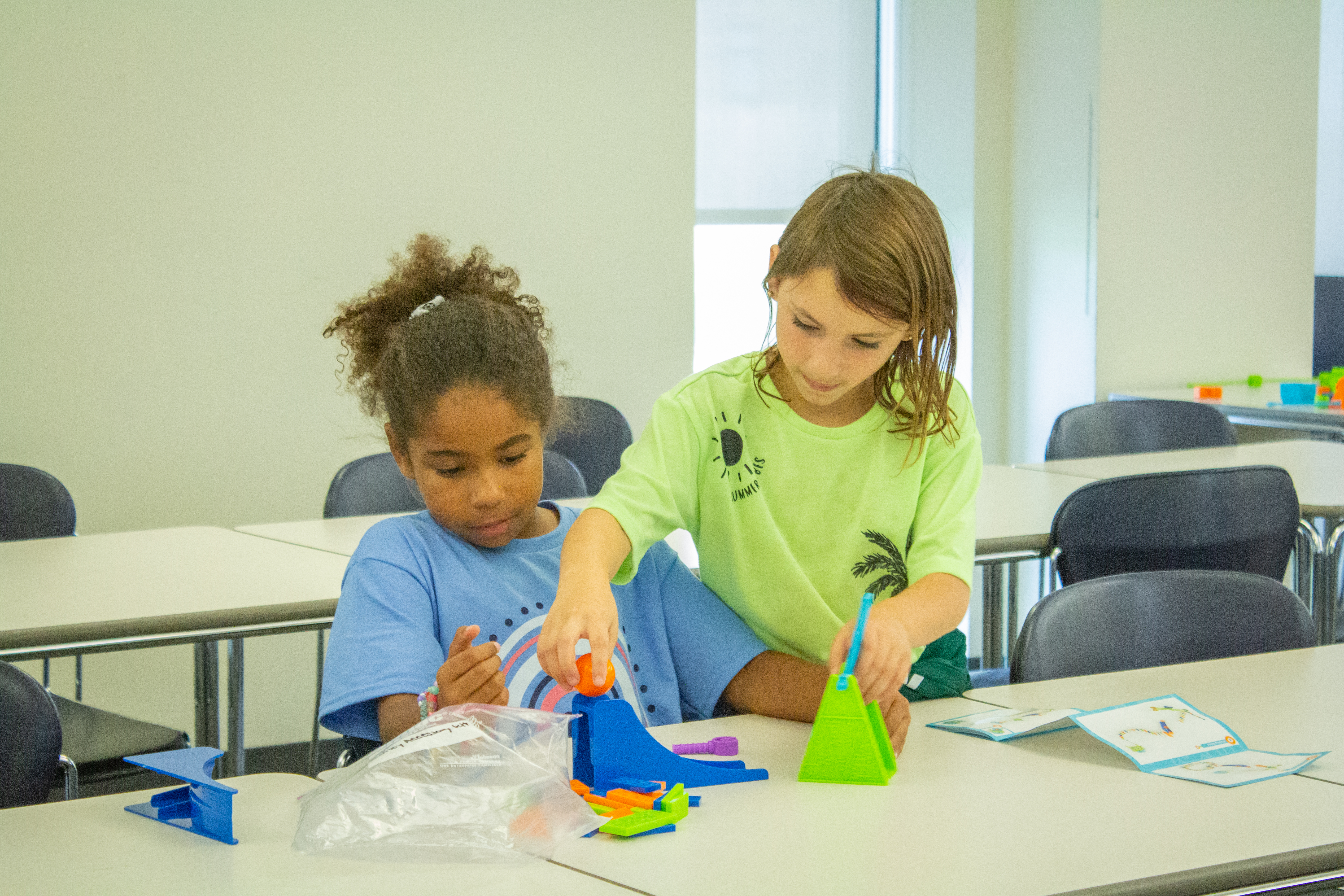 Two children playing with toys